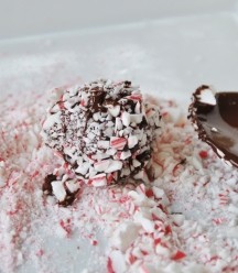 Vegan Raw Cookie Dough Balls being rolled in crushed candy cane