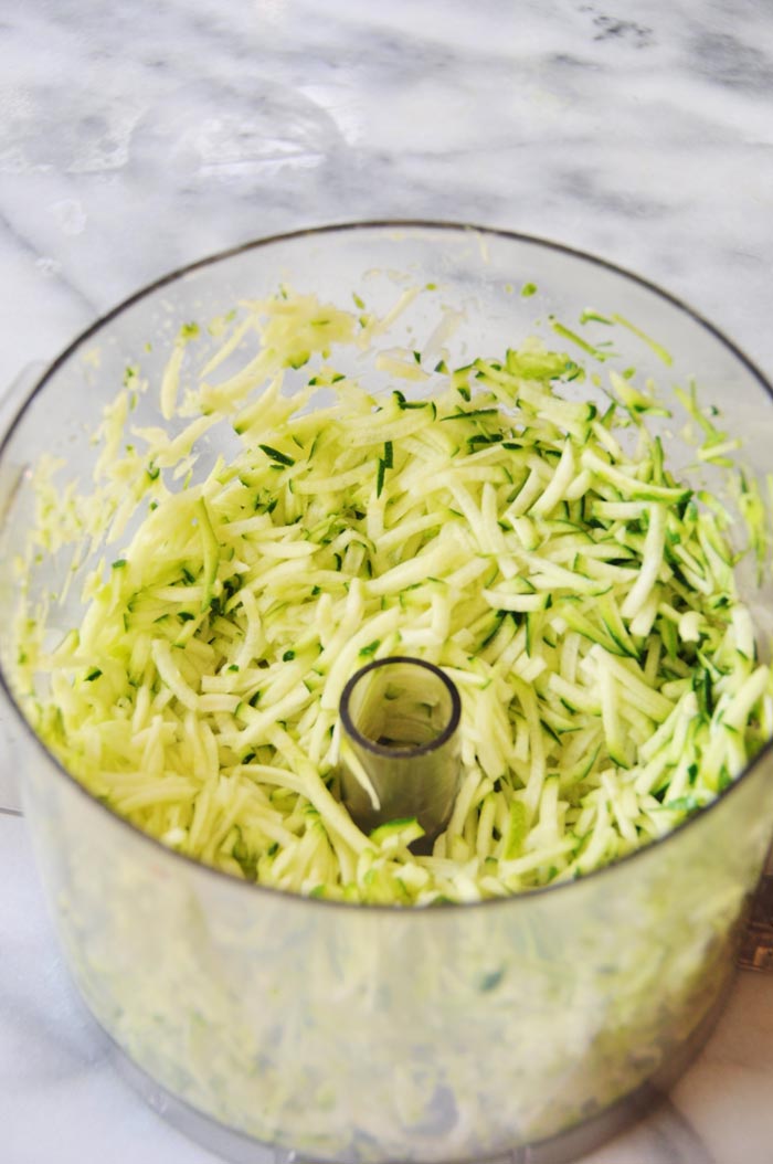 shredded-zucchini in a food procesor