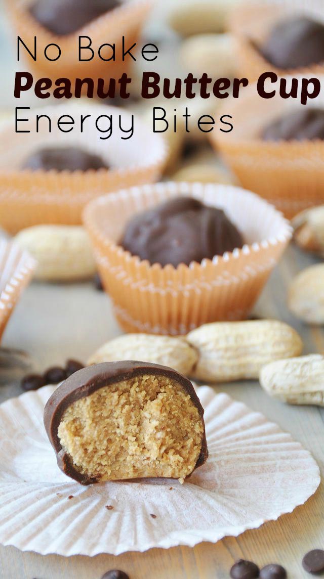 Peanut butter cup energy bites with a bite taken out of the front one.