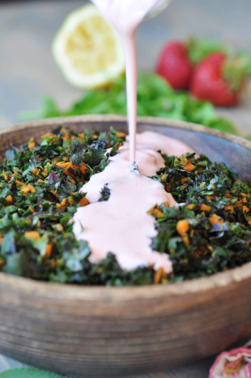 Crunchy red kale and carrots smothered in a creamy vegan strawberry sage dressing with a hint of mint. This salad recipe is perfect as a meal or a side. www.veganosity.com