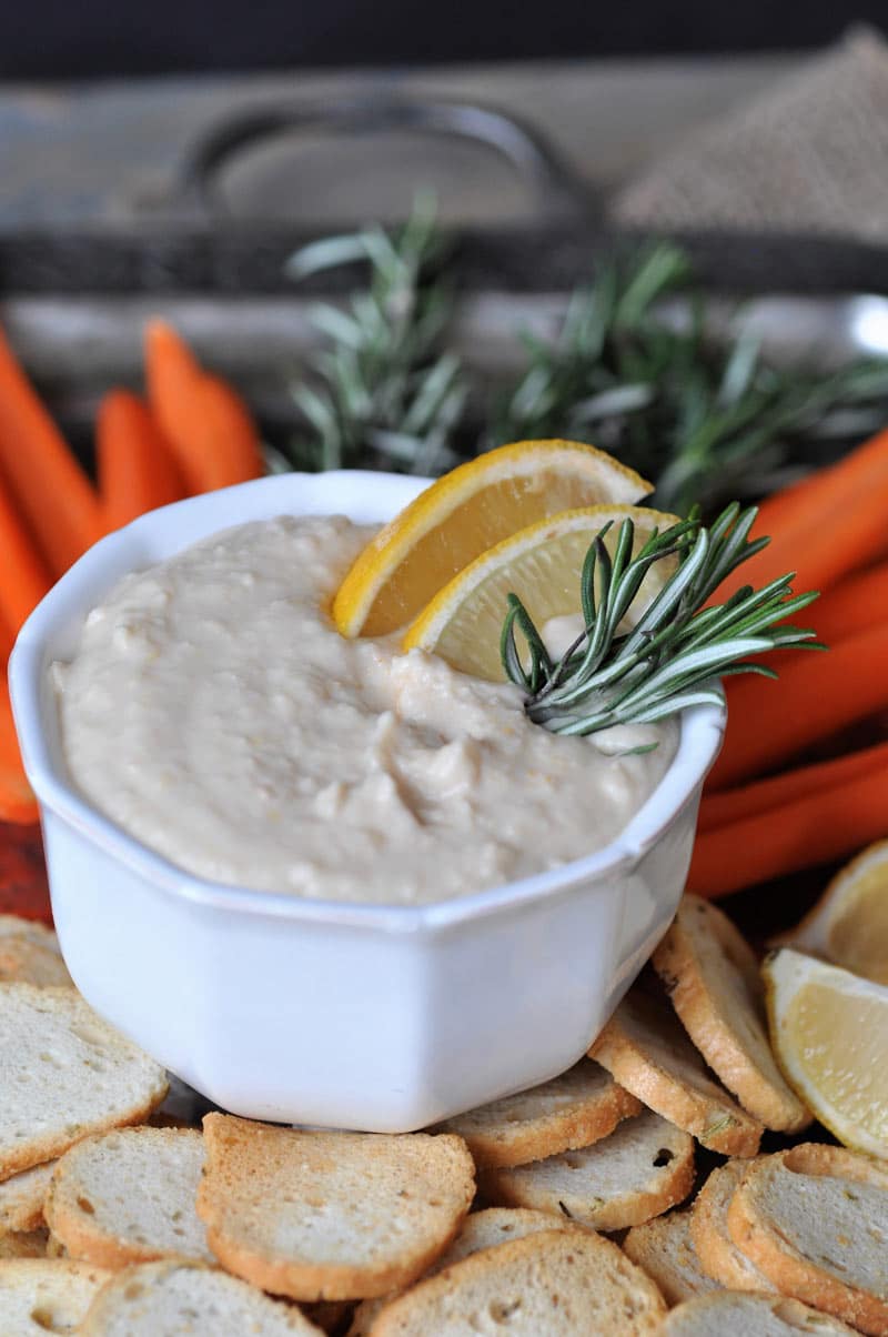 Tangy and bright lemon with savory rosemary and creamy white beans. The perfect vegan appetizer dip!