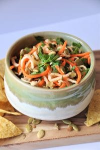 Jicama, carrots, Pablano pepper, in a refreshing lime dressing, topped with roasted pepitas! The perfect slaw salsa appetizer!