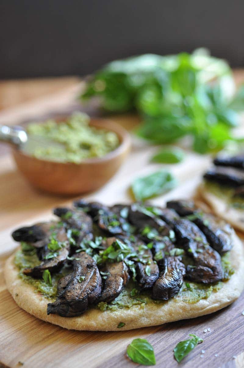 The perfect easy dinner or appetizer. Homemade flatbread with pesto & portobello mushrooms.