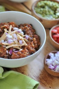 Hearty veggie chili that will satisfy meat eaters. Vegan, easy to make, and delicious!