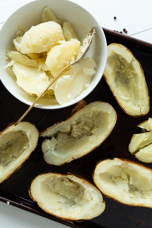 Twice baked ranch potatoes with center of the potatoes scooped out