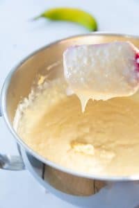 process shot of cake batter in a mixing bowl
