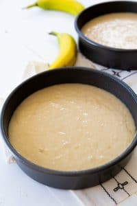 process shot of cake batter in a round cake pan