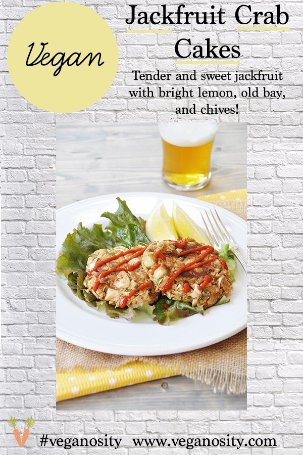 A Pinterest pin with a picture of jackfruit Crab Cakes on a white plate with a beer in the background. 
