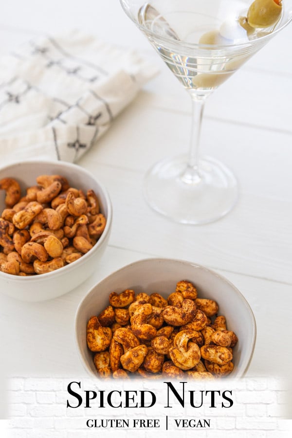 A Pinterest pin for spiced nuts with a picture of 2 bowls of the nuts.